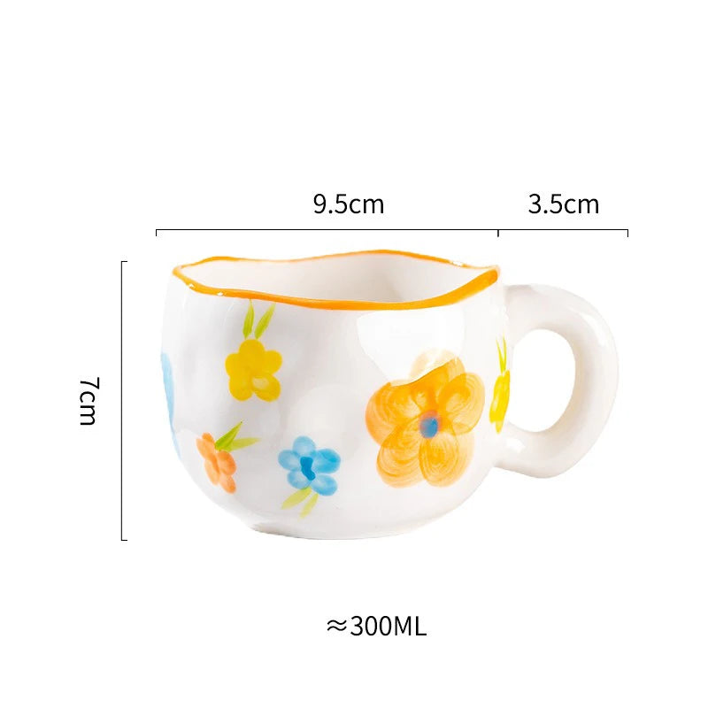 painted topsy mugs