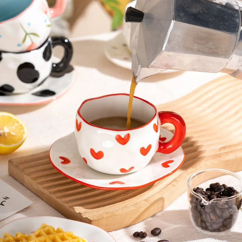 painted topsy mugs